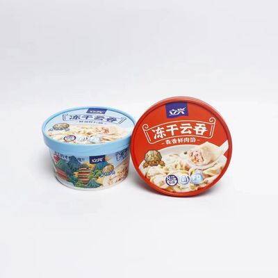 Un bol de papier jetable wonton lyophilisé avec un seau en papier couvercle nouilles instantanées emballement de nourriture à emporter tasse de boisson chaude